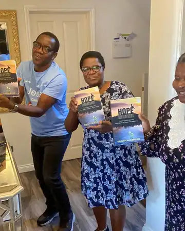 Author holding Hope Redefined